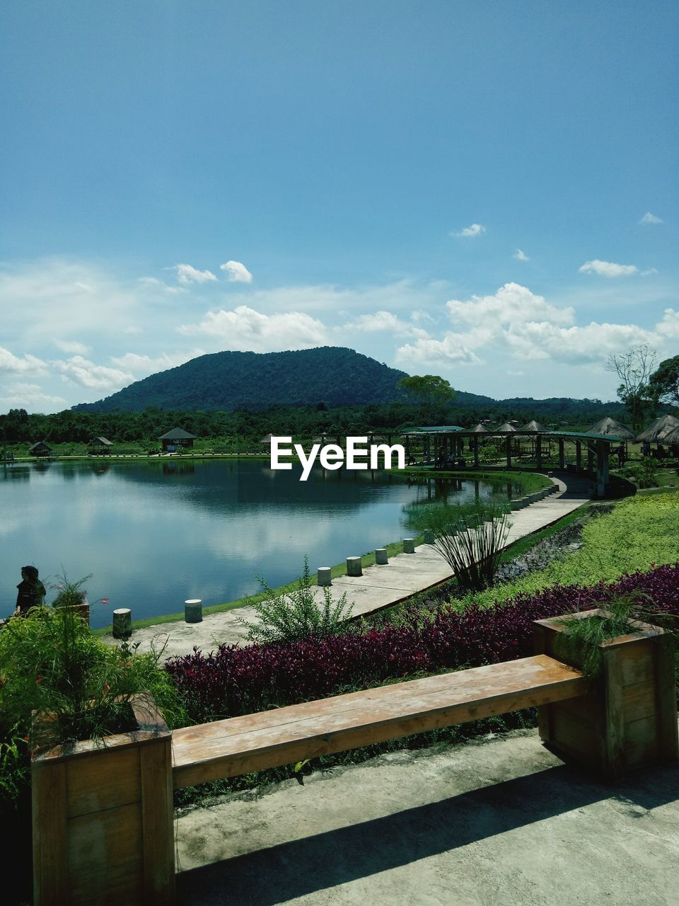 Scenic view of lake against blue sky