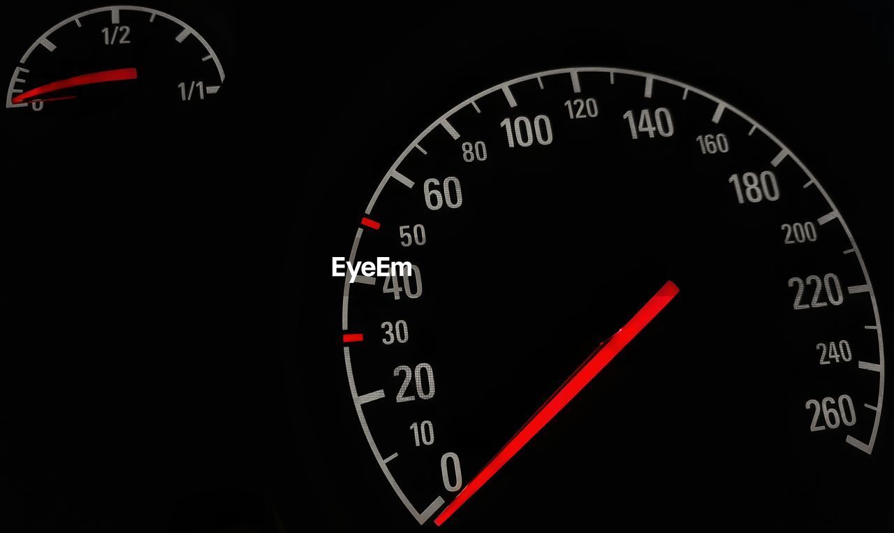 Low angle view of road sign against clear sky