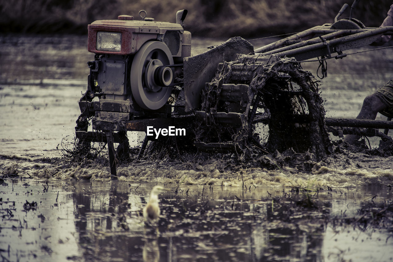 ABANDONED VINTAGE CAR ON LAND