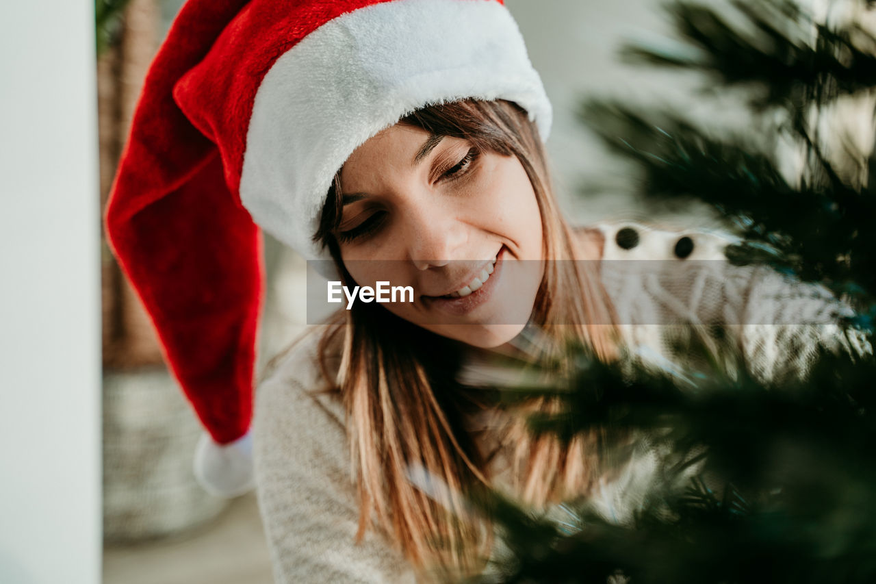 Portrait of smiling young woman in winter