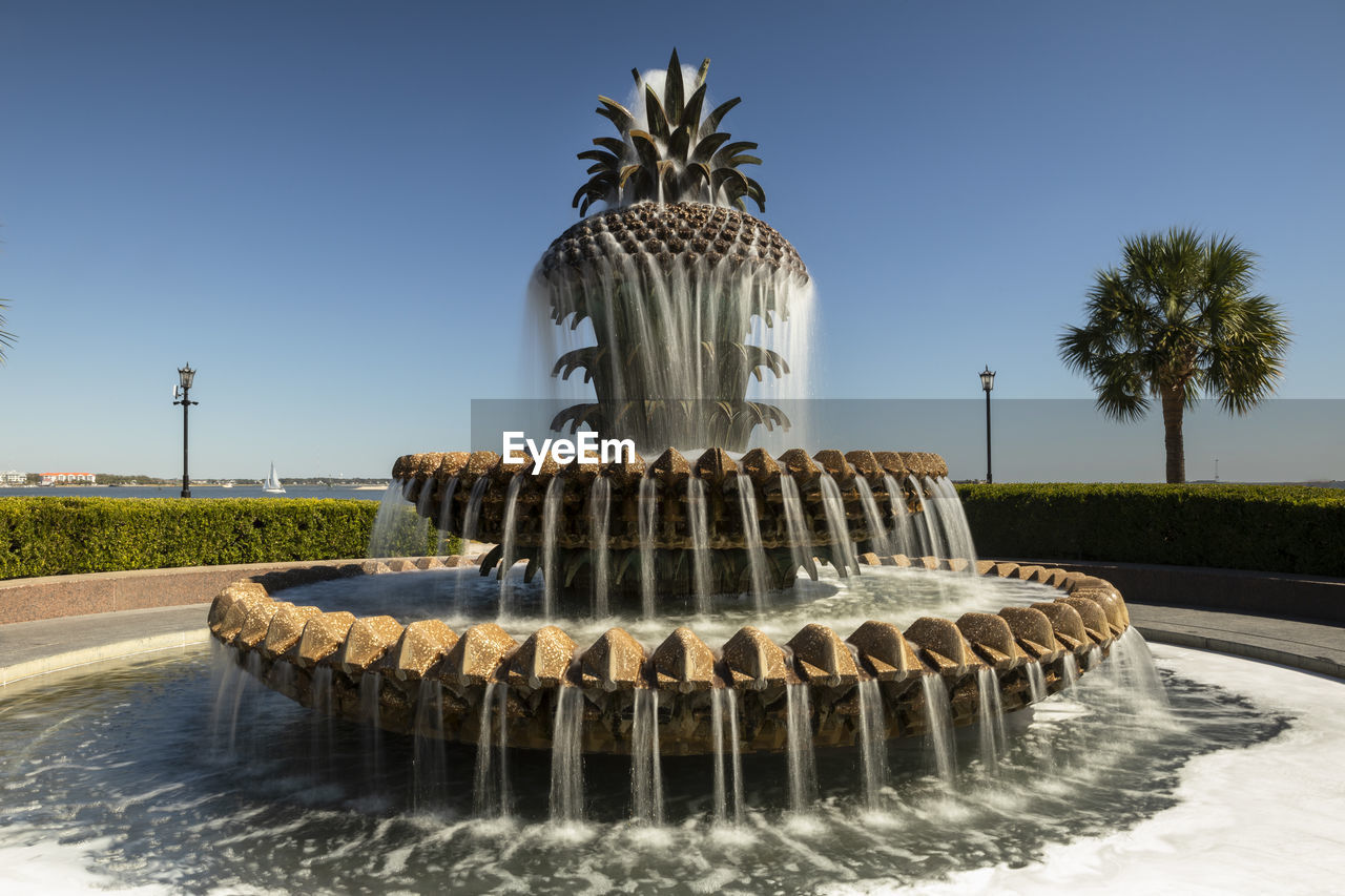 FOUNTAIN IN FRONT OF BUILT STRUCTURE