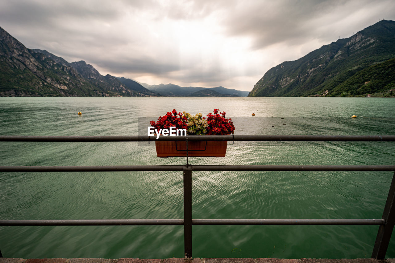 Scenic view of sea against cloudy sky