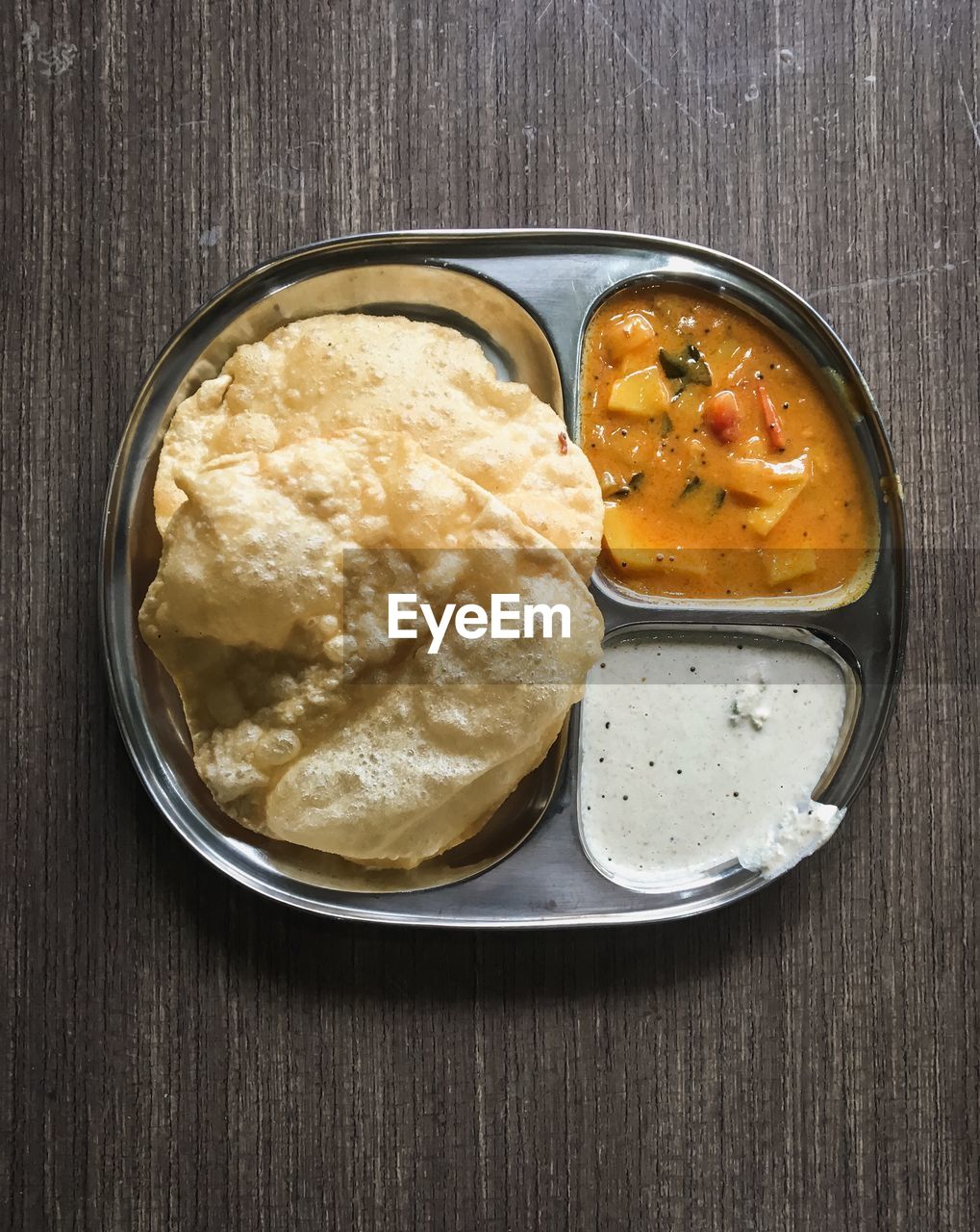 High angle view of indian food in bowl on table