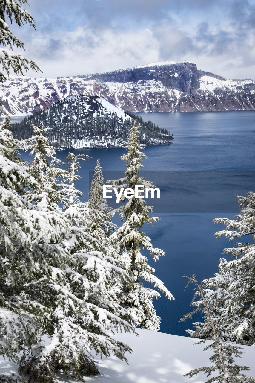 Scenic view of snow covered mountain against sky