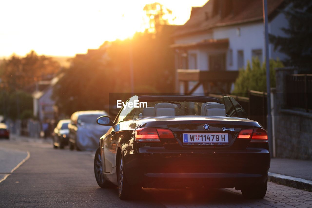 CARS ON STREET IN CITY