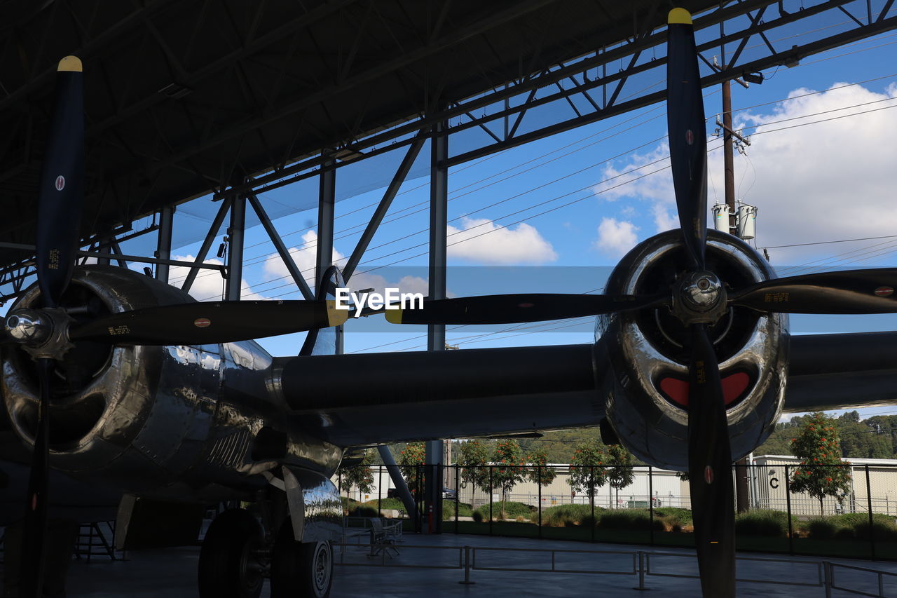 airplane, transportation, aviation, air vehicle, aircraft, vehicle, mode of transportation, sky, air force, military aircraft, architecture, aerospace industry, aircraft engine, no people, cloud, nature, day, airport, outdoors, built structure, screenshot, wheel, military