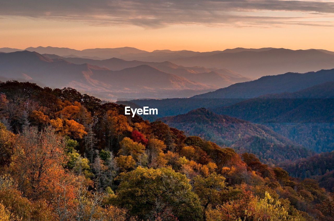 Scenic view of mountains against sky during sunset