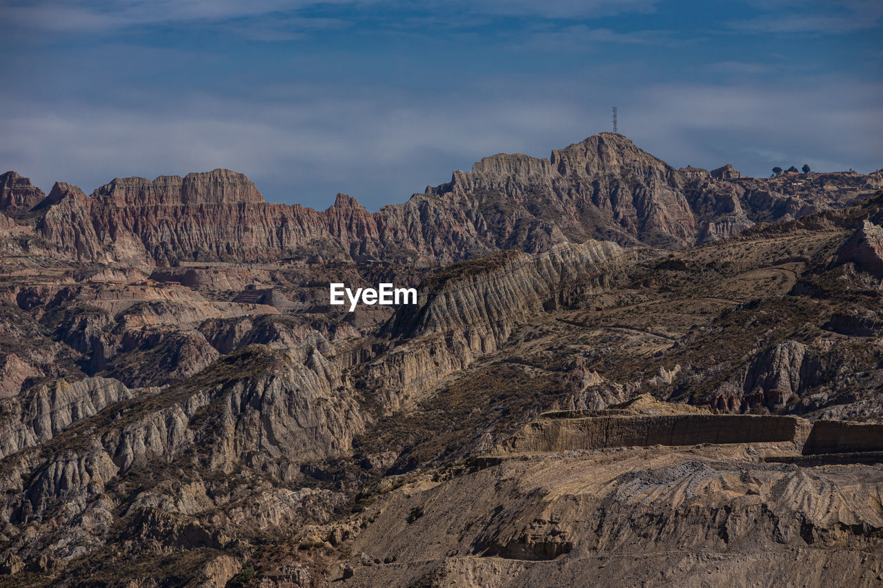 Panoramic view of rocky mountains against sky