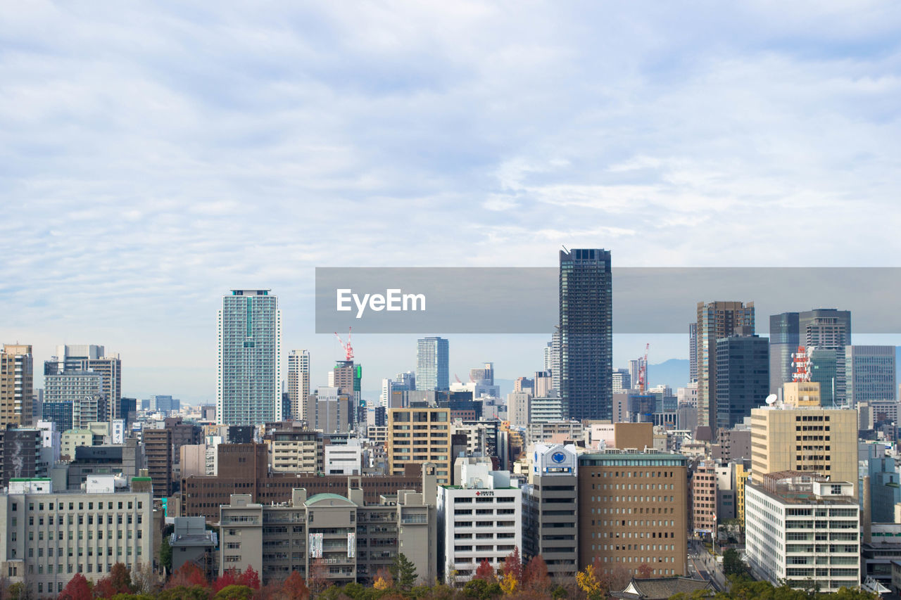 MODERN BUILDINGS AGAINST SKY