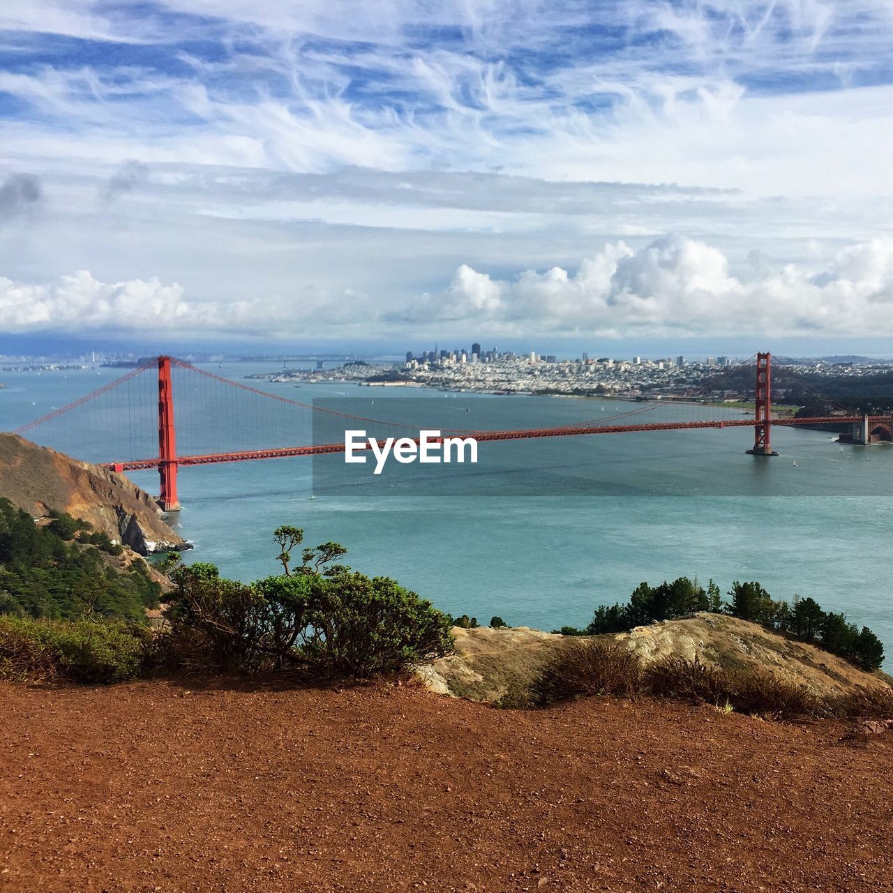 Golden gate bridge over san francisco bay against cloudy sky