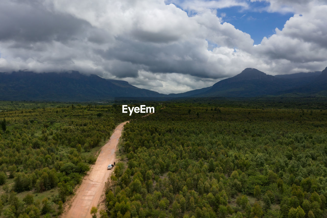 Scenic view of canyon road against sky