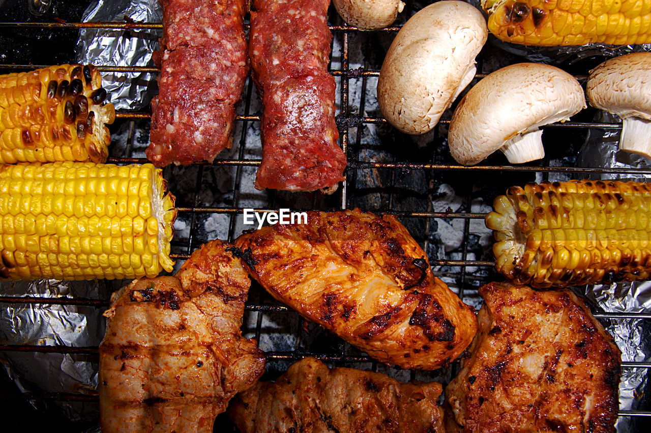 Directly above view of food grilling on barbeque