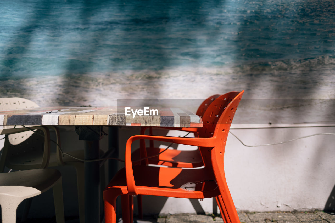 View of empty chair and table at restaurant