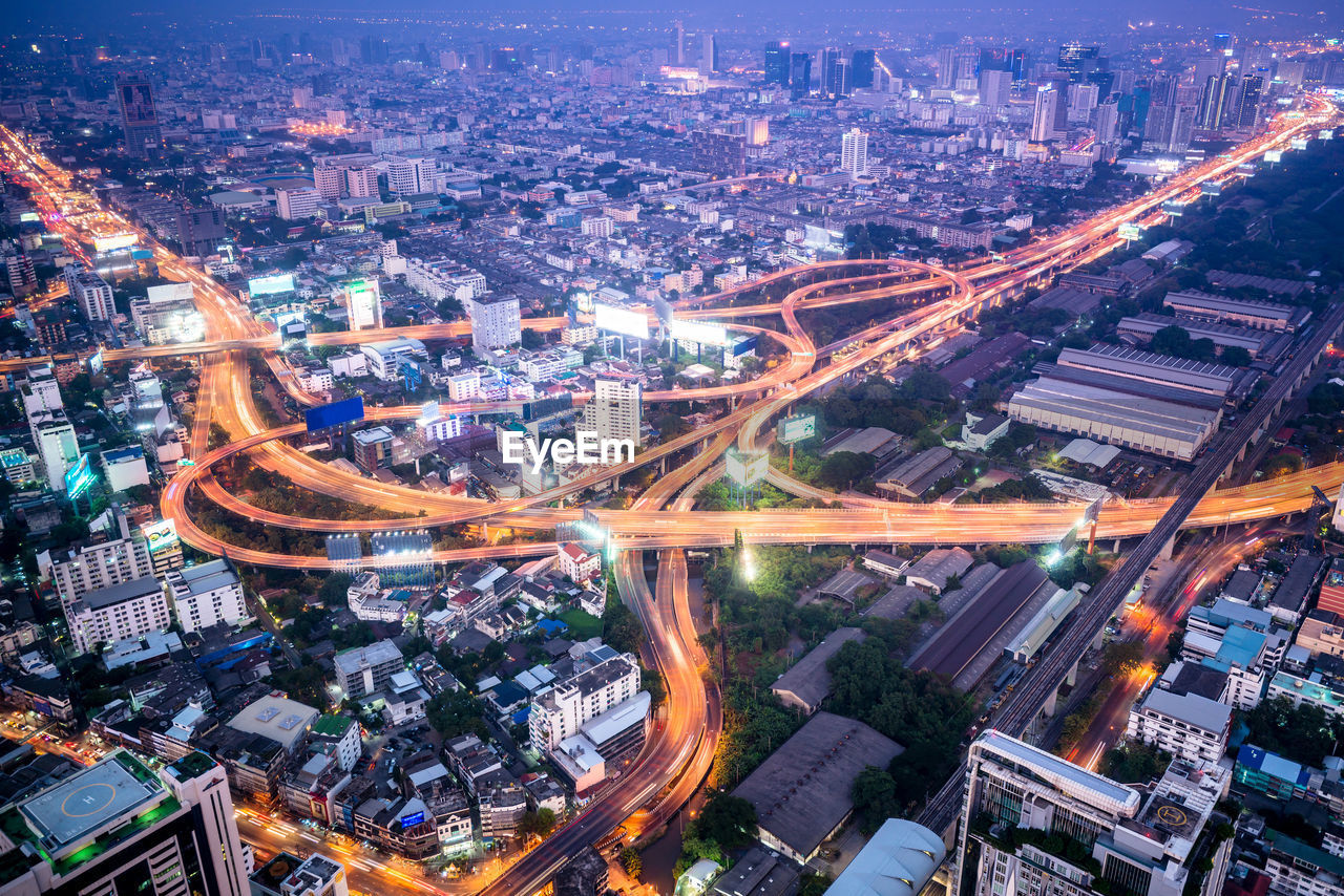 High angle view of illuminated cityscape at night