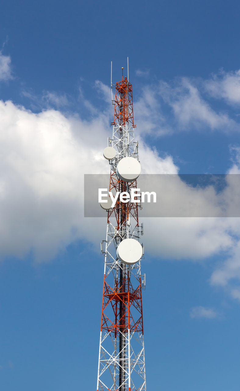 Low angle view of communications tower against sky