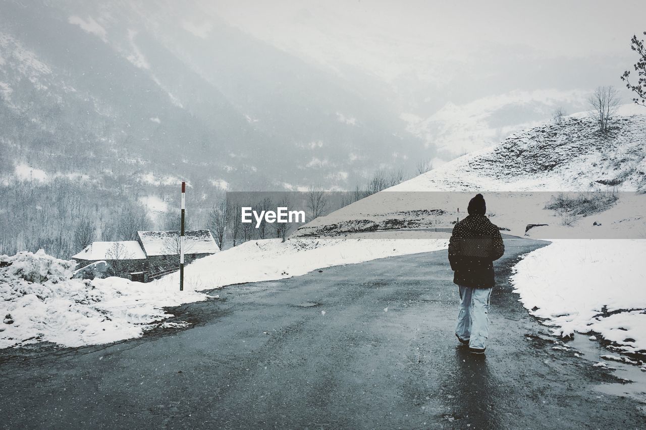 Scenic view of snow covered mountains