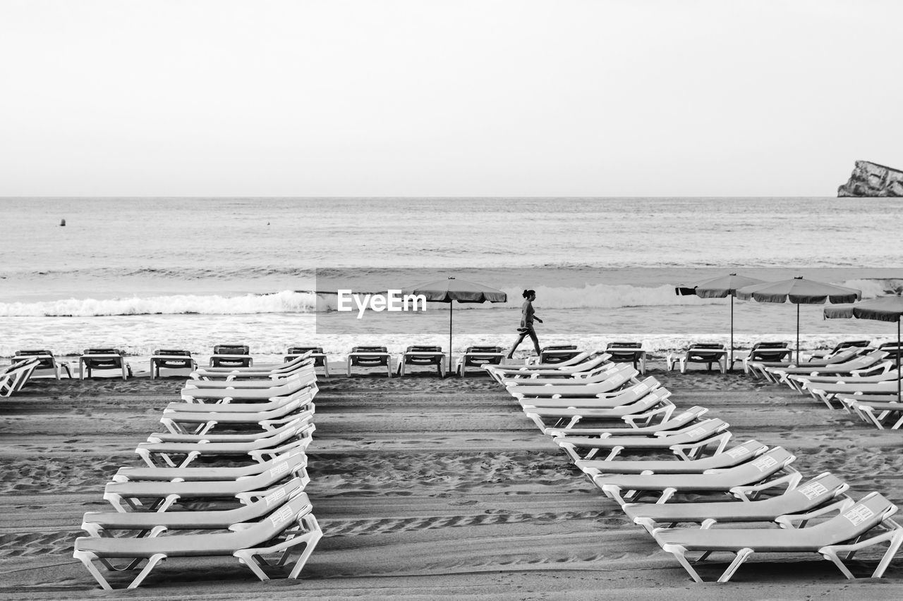 Scenic view of beach against clear sky