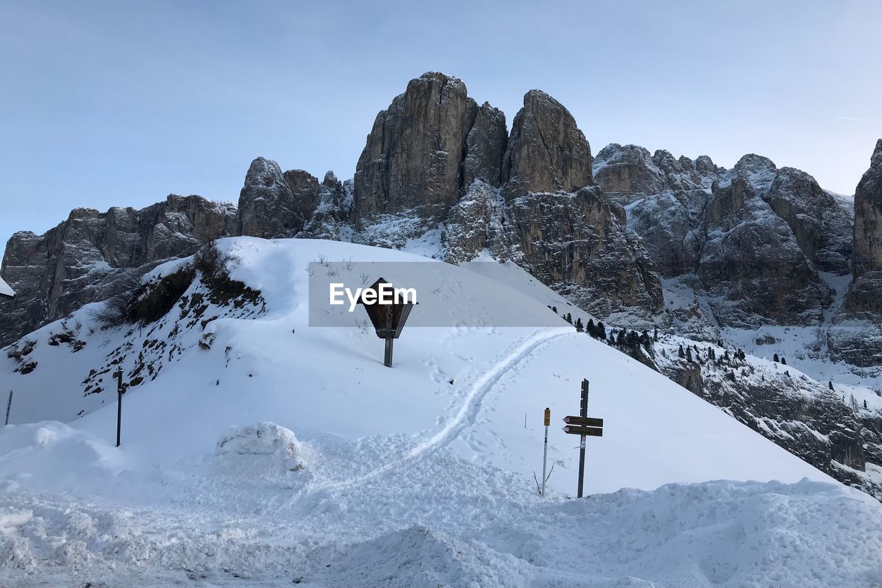 Snow covered mountain against clear sky