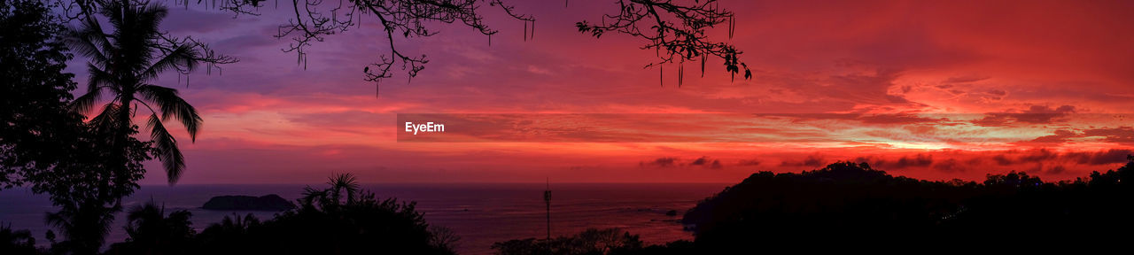 SCENIC VIEW OF SEA DURING SUNSET