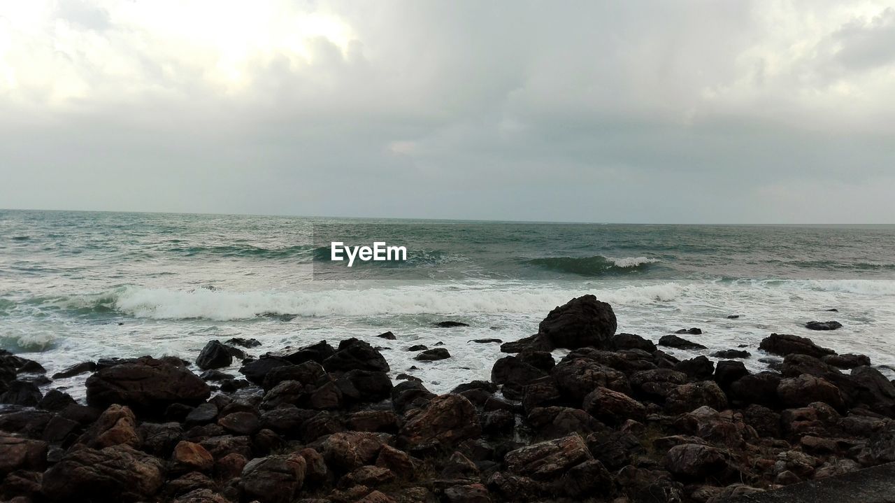 SCENIC VIEW OF SEA AND ROCKS