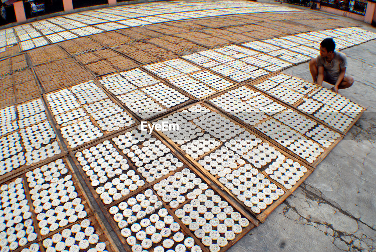 A number of workers producing crackers in the home-based cracker industry in the tangerang area