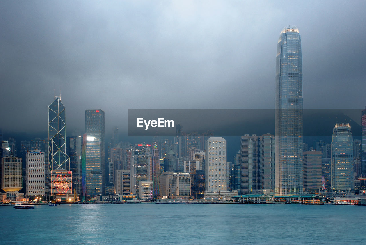 Hong kong skyline at dusk in a foggy weather