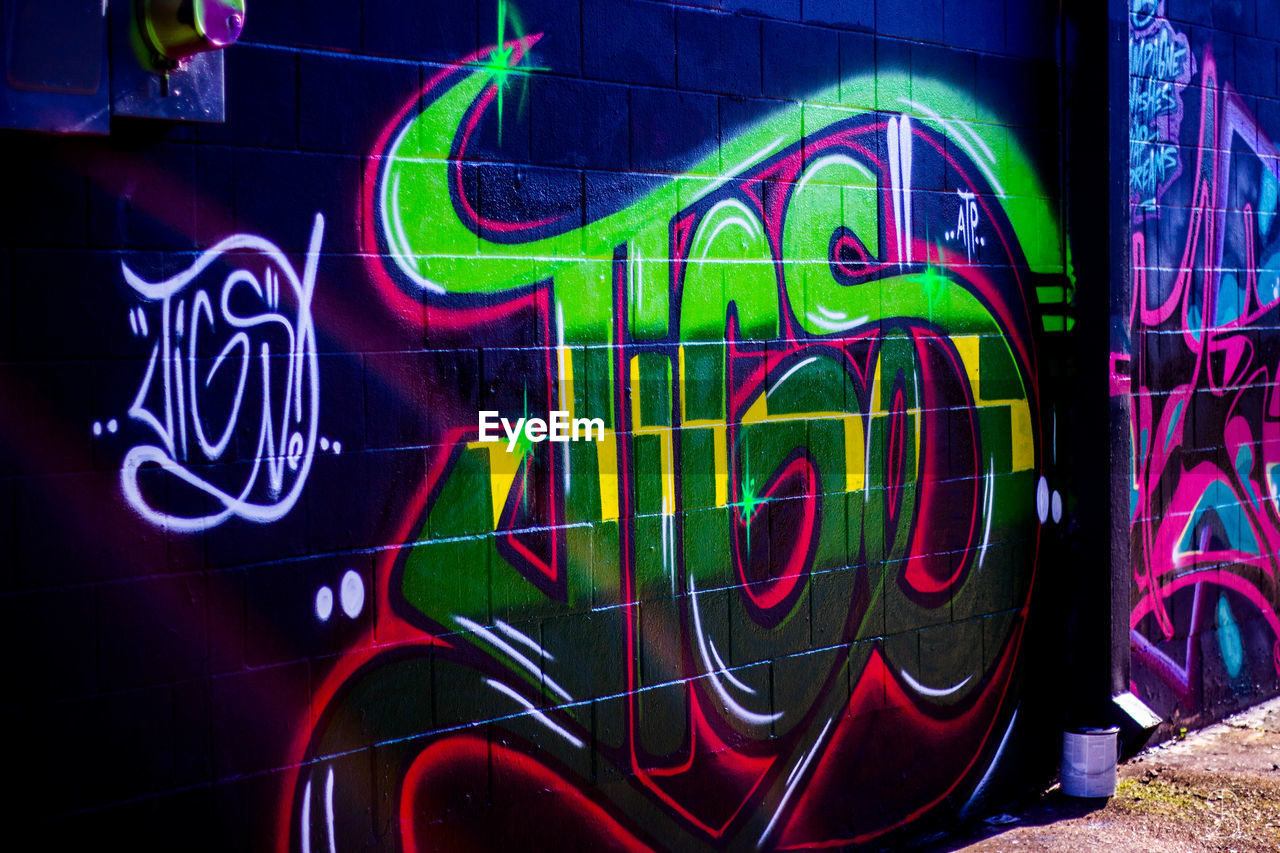 graffiti, multi colored, creativity, art, night, no people, architecture, neon, street art, illuminated, text, font, wall - building feature, city, communication