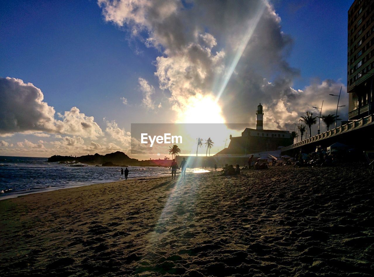 VIEW OF CALM BEACH AGAINST BLUE SKY