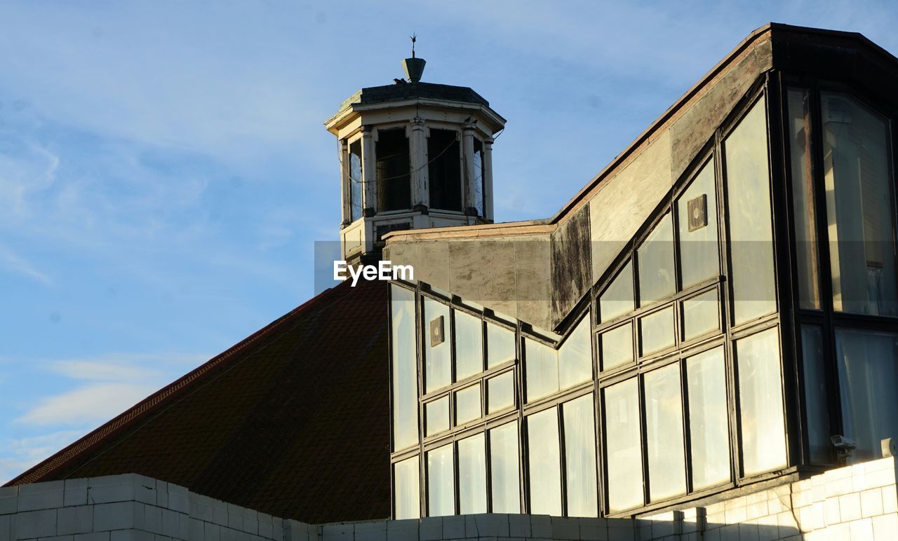 architecture, built structure, building exterior, sky, building, facade, house, nature, no people, city, tower, cloud, landmark, day, travel destinations, history, the past, outdoors, low angle view, place of worship, sunlight, window, travel, urban area