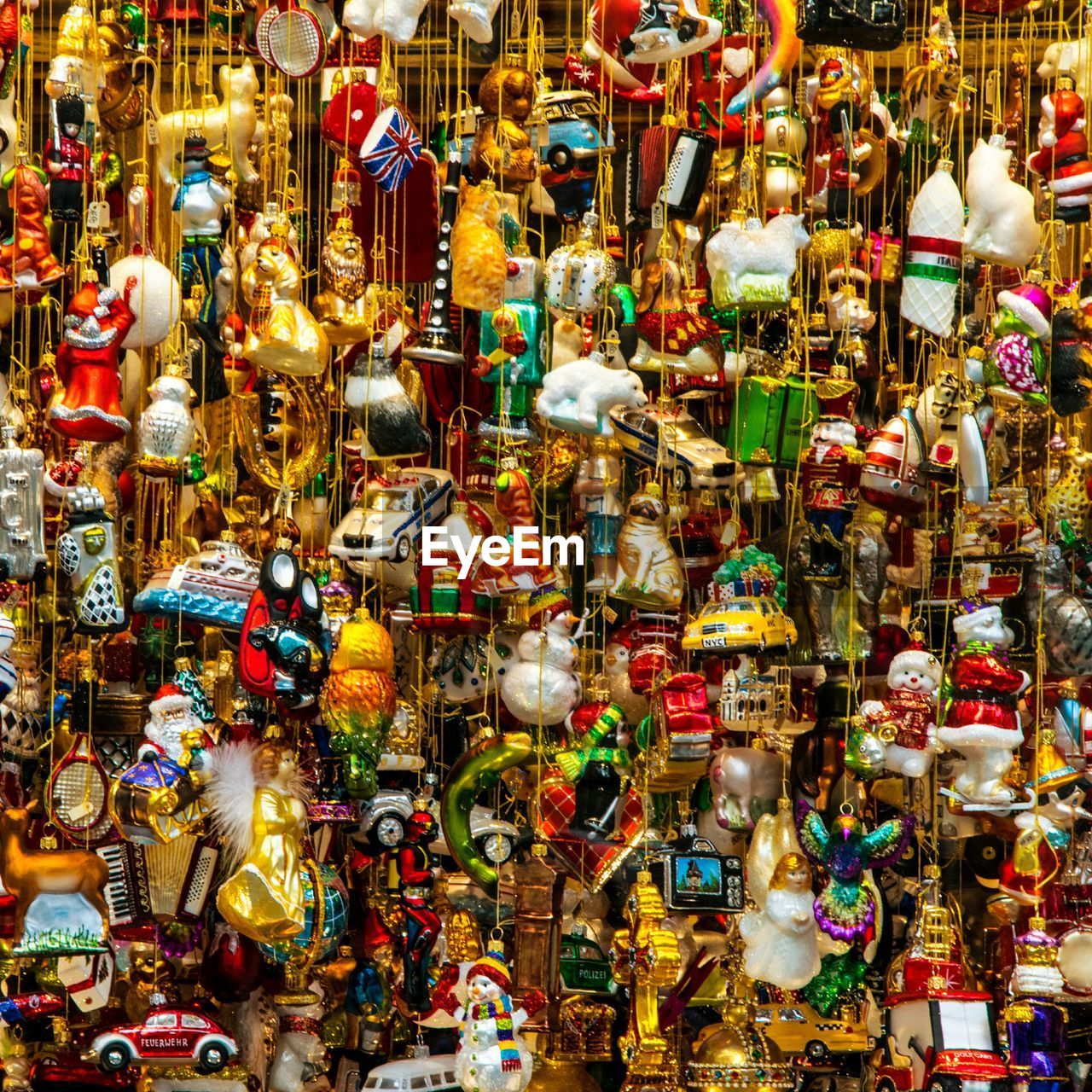 Full frame shot of various christmas decoration hanging for sale at market stall