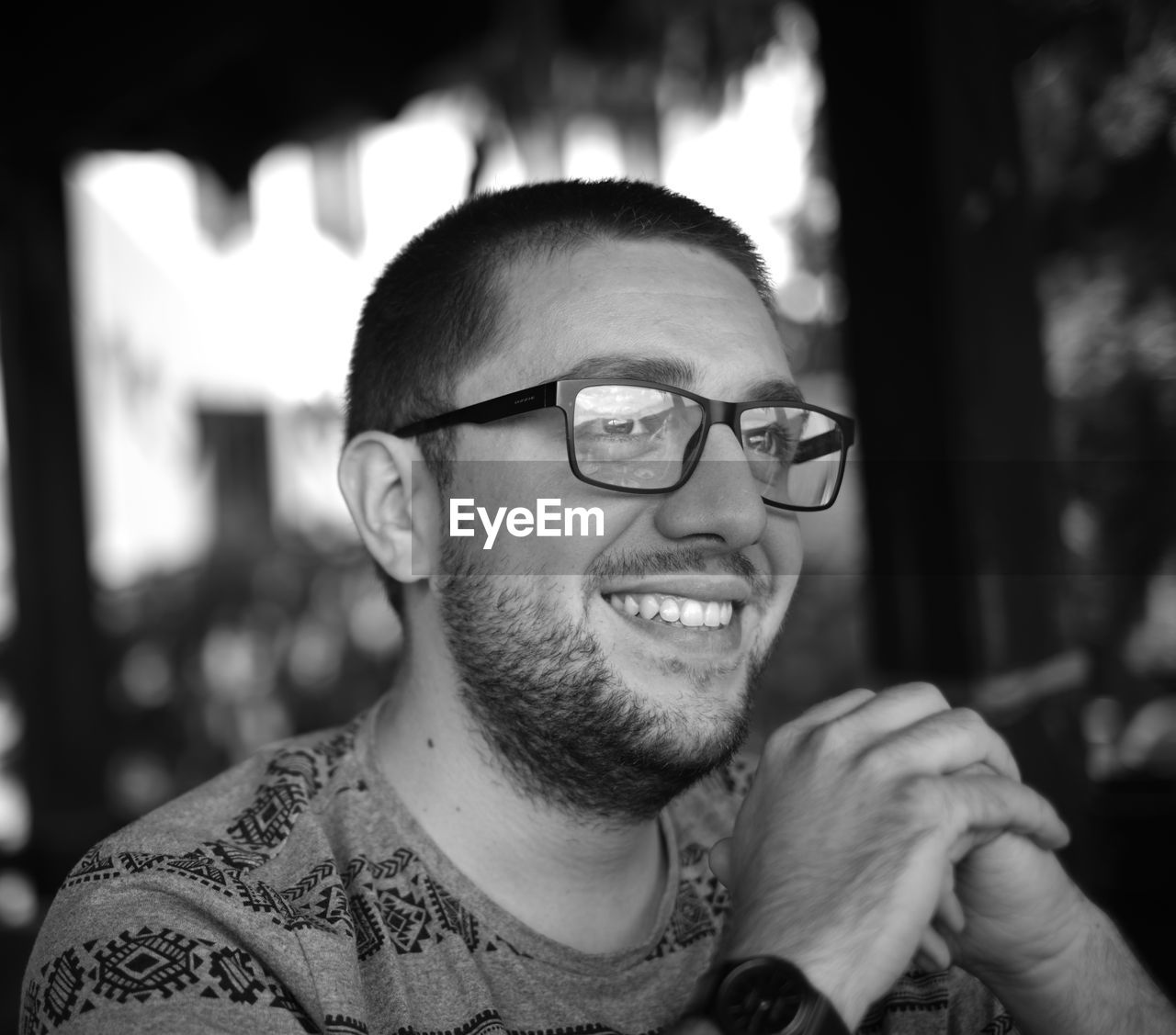 Close-up portrait of smiling young man