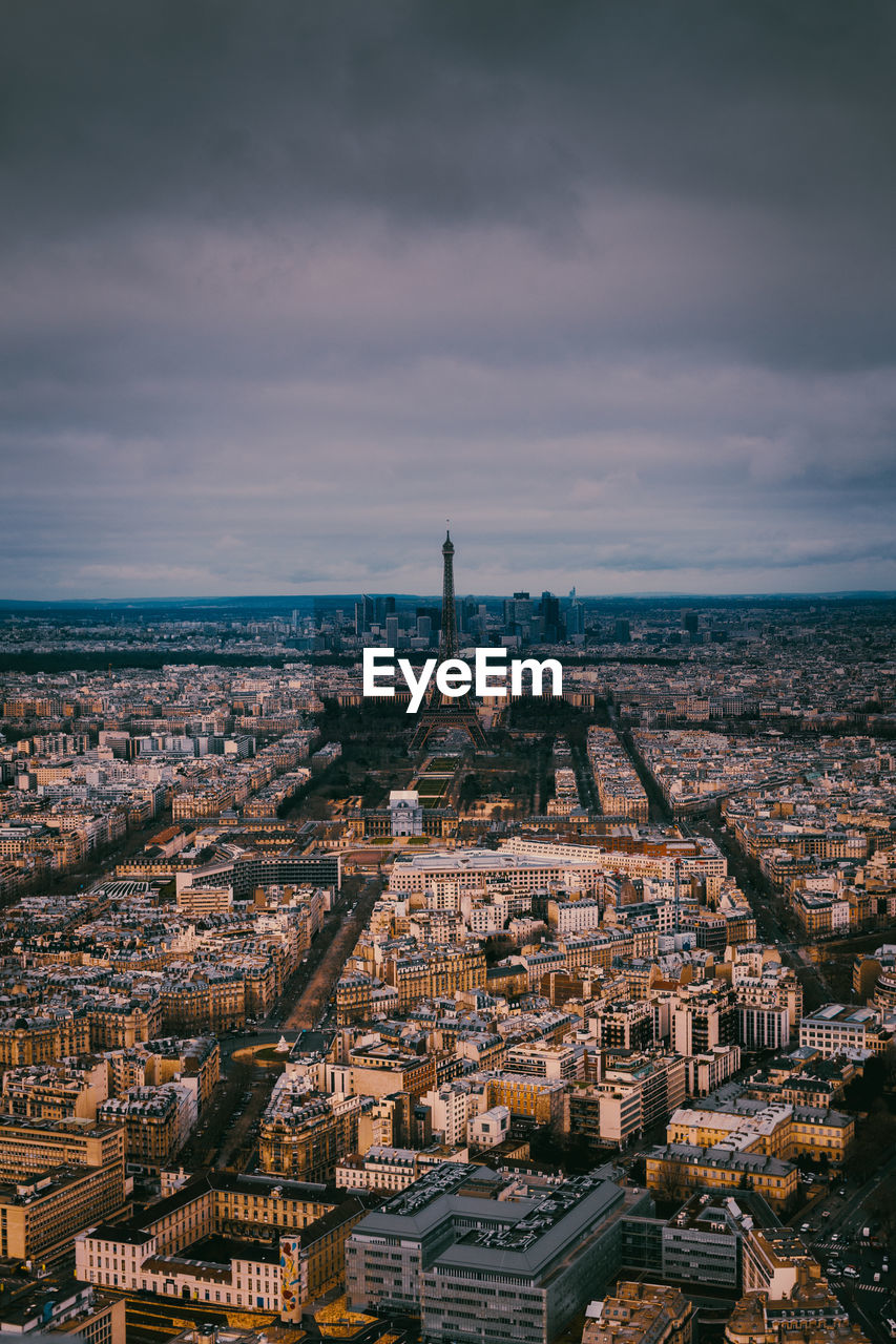 Distant view of eiffel tower amidst cityscape