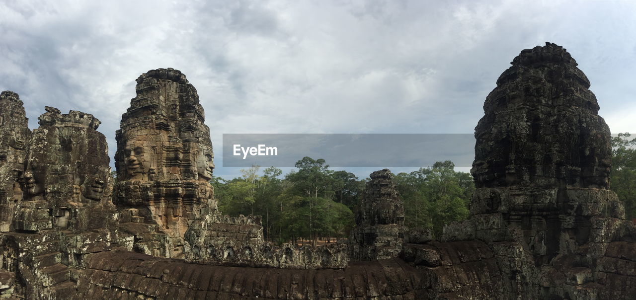 VIEW OF TEMPLE AGAINST CLOUDY SKY