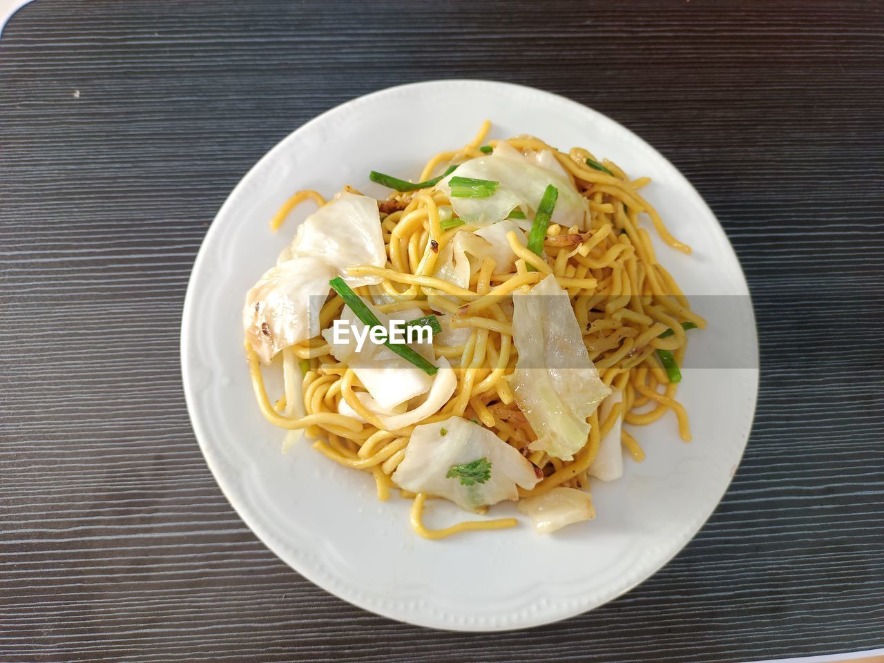 High angle view of pasta in plate on table