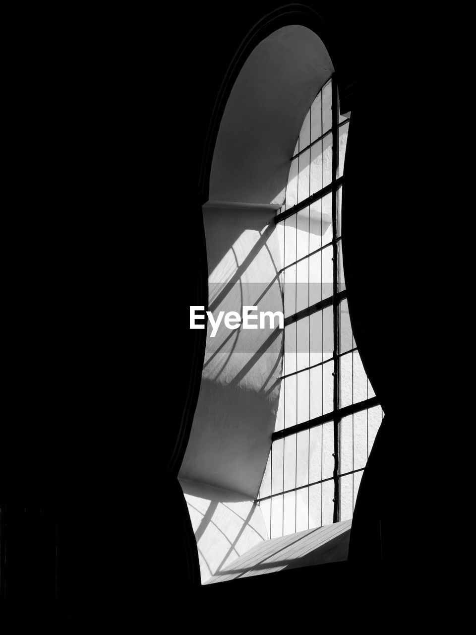 black and white, black, architecture, window, built structure, indoors, silhouette, monochrome photography, monochrome, light, darkness, white, low angle view, no people, glass, sky, copy space, nature, building, dark, sunlight, day