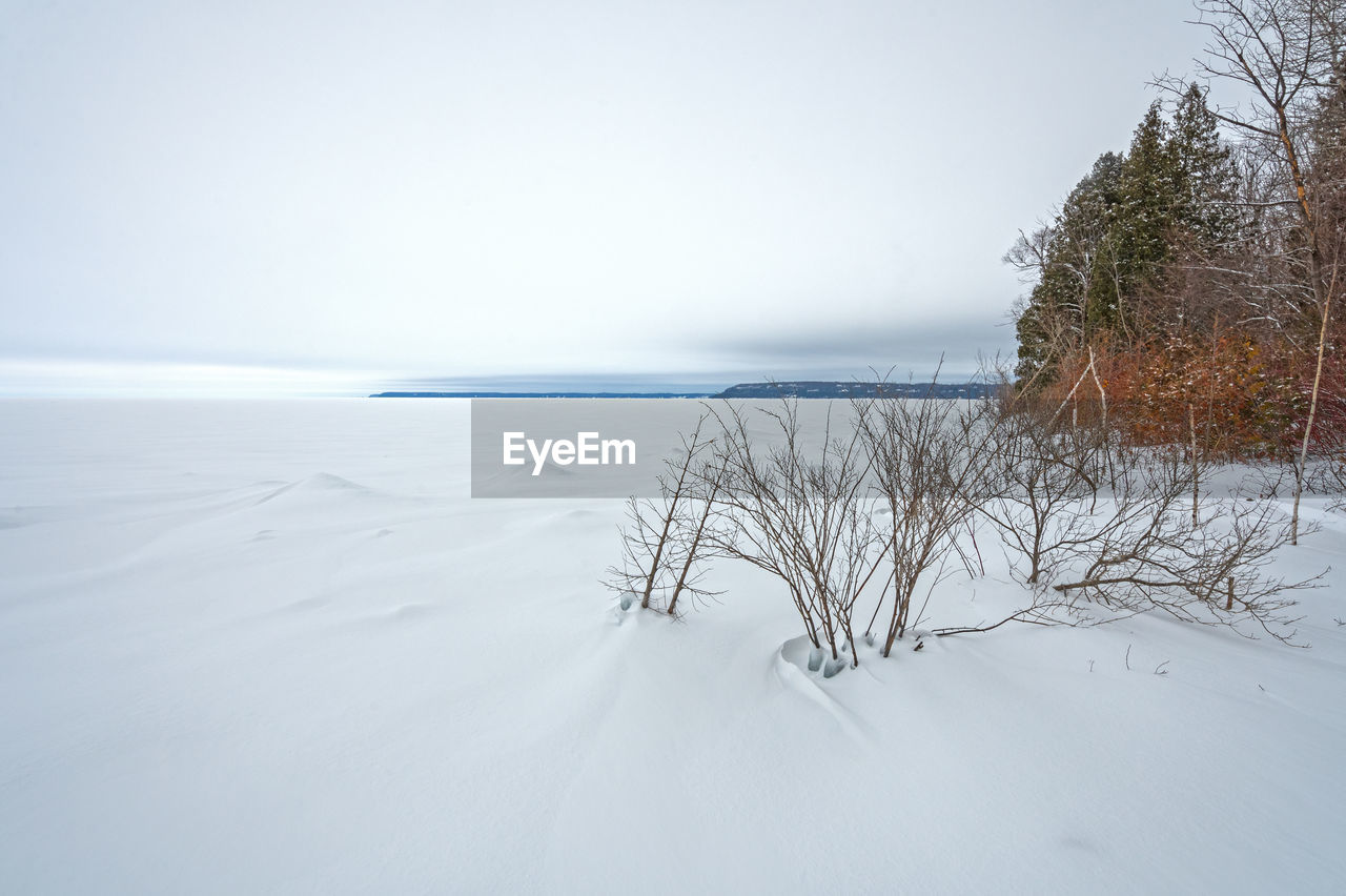 Frozen lakeshore panorama in winter on lake michigan in peninsula state park in wisconsin