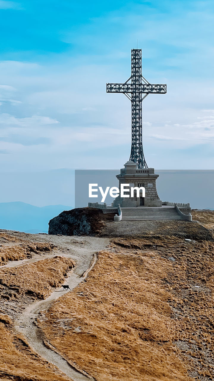 Scenic view of caraiman cross against sky