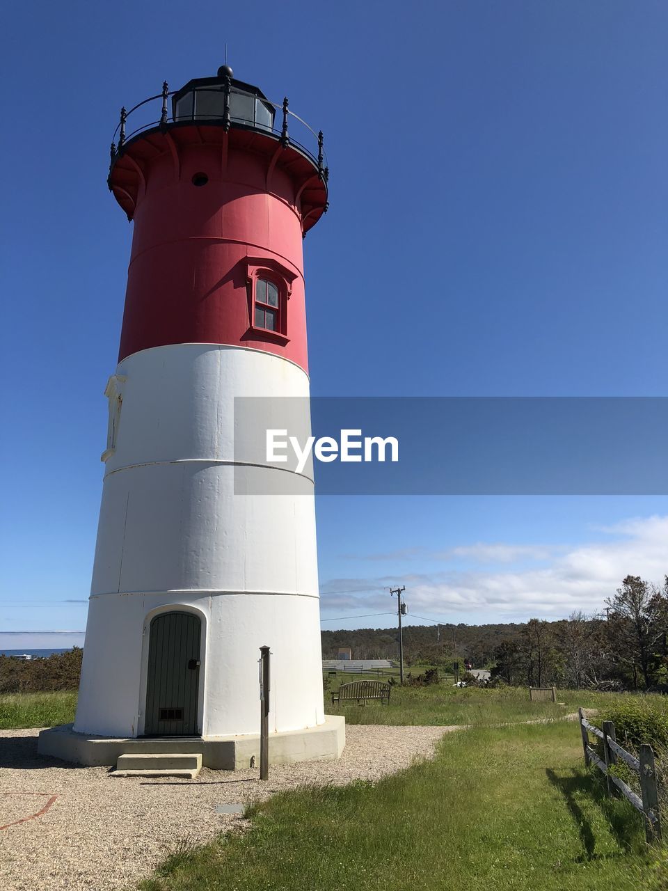 LOW ANGLE VIEW OF LIGHTHOUSE AGAINST CLEAR SKY