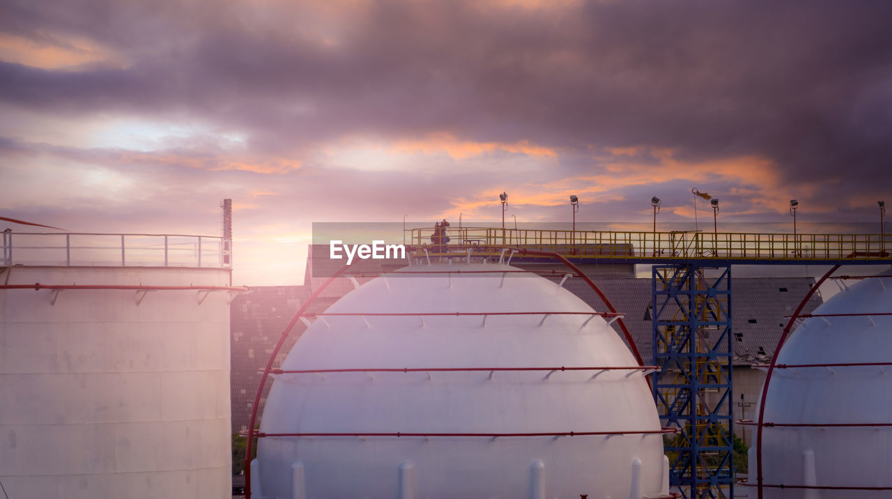 industry, cloud, sky, architecture, reflection, power generation, sunset, nature, business finance and industry, business, built structure, technology, factory, environment, evening, sunlight, outdoors, no people, water, transportation, fossil fuel, dusk, environmental issues, oil industry