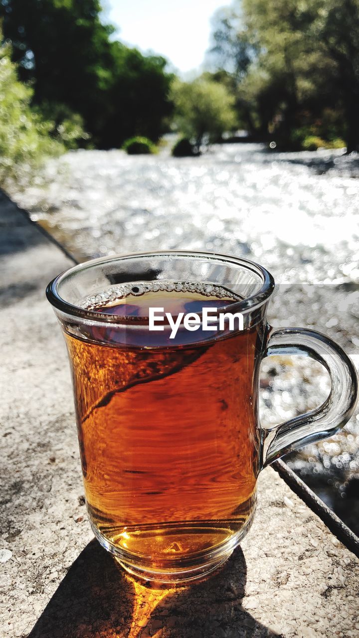 CLOSE-UP OF TEA CUP ON TABLE