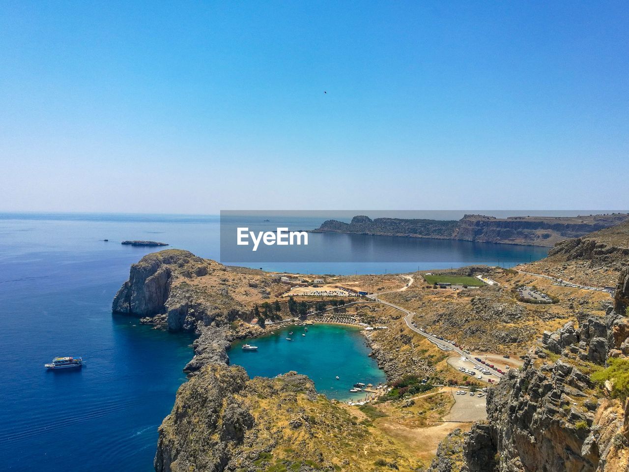 Panoramic view of sea against clear sky