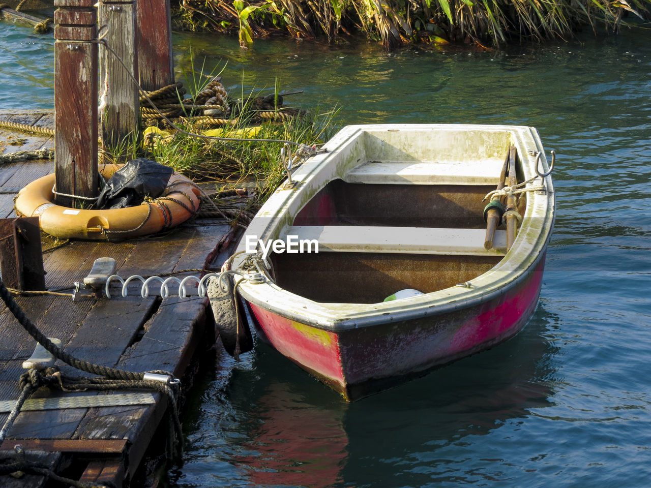 High angle view of boat moored in lake