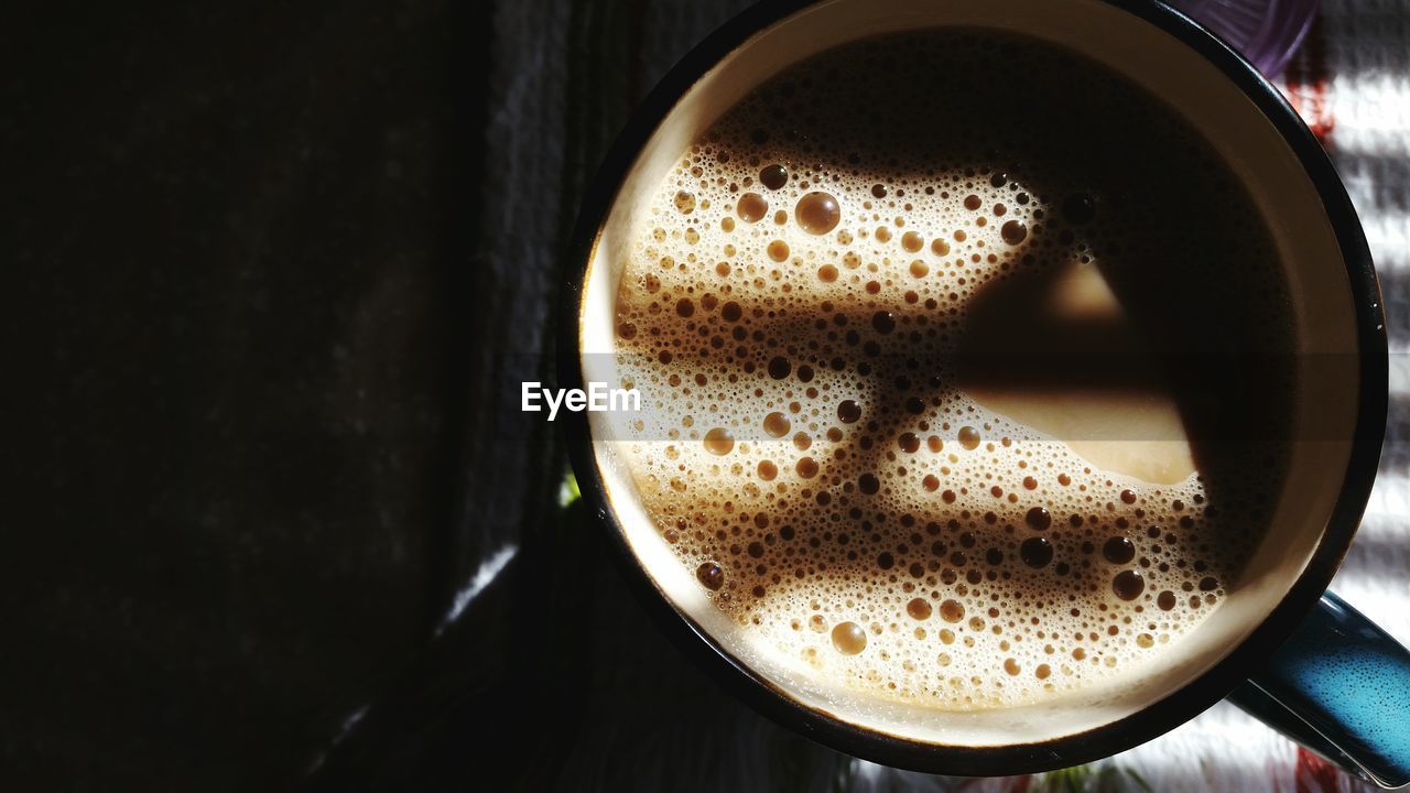 High angle view of tea in mug on table