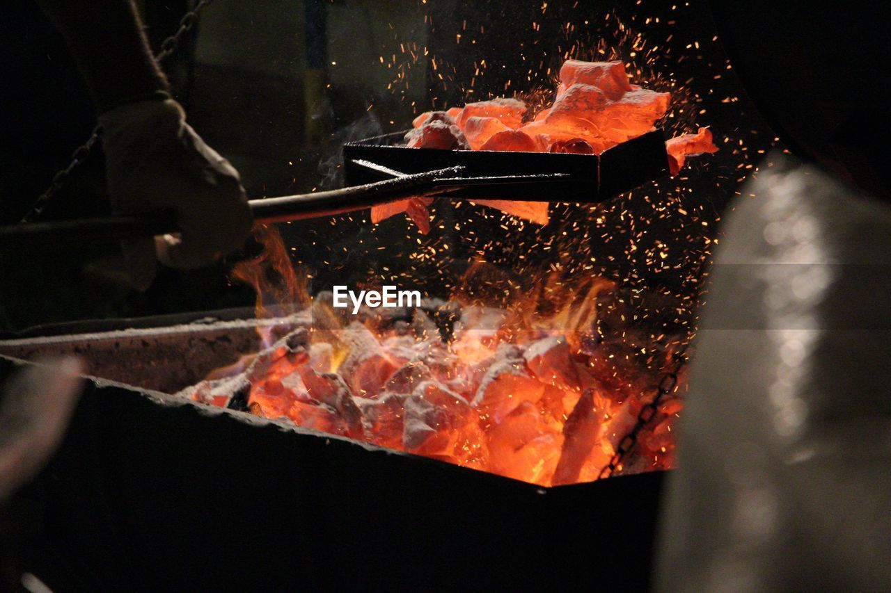 CLOSE-UP OF FIRE ON BARBECUE