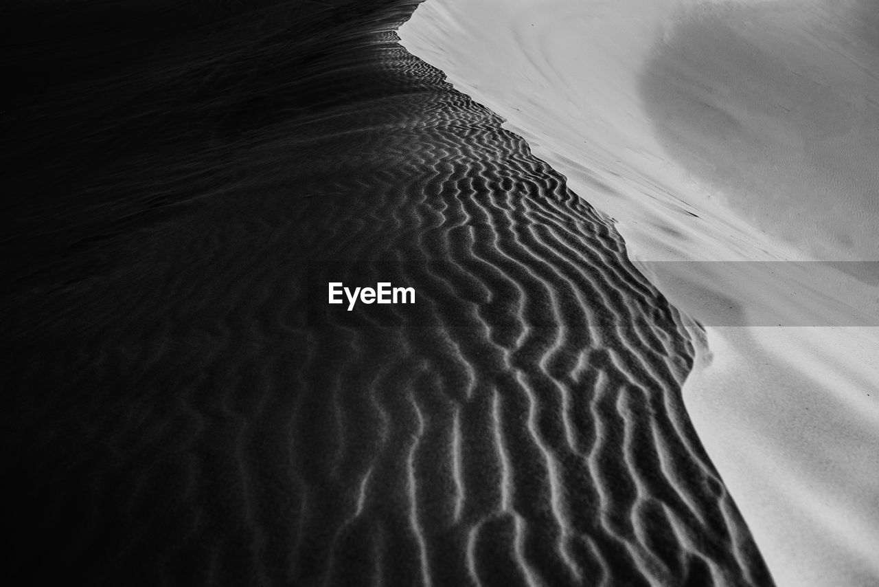 High angle view of sand dunes at beach