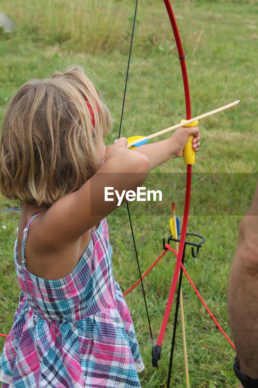 My daughter trying archery for the first time