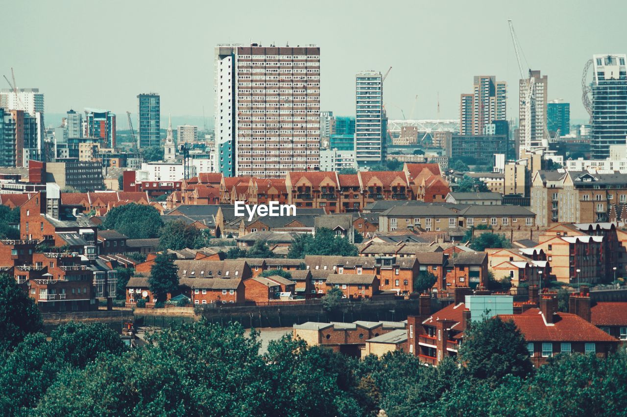 High angle shot of townscape against clear sky