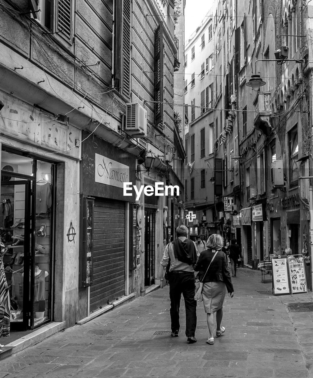 PEOPLE WALKING IN CITY