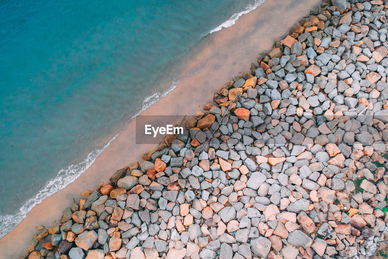 Aerial view of stones at beach