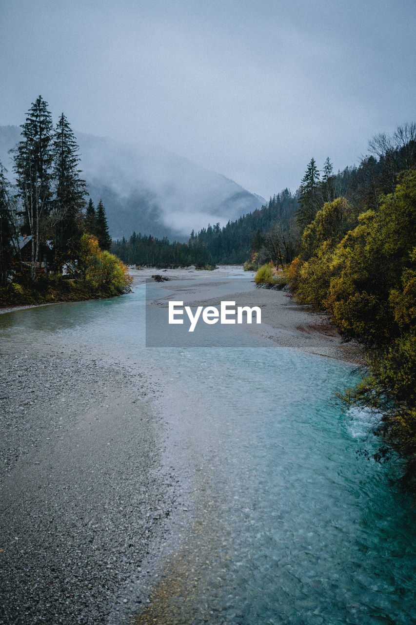 scenic view of lake against mountain